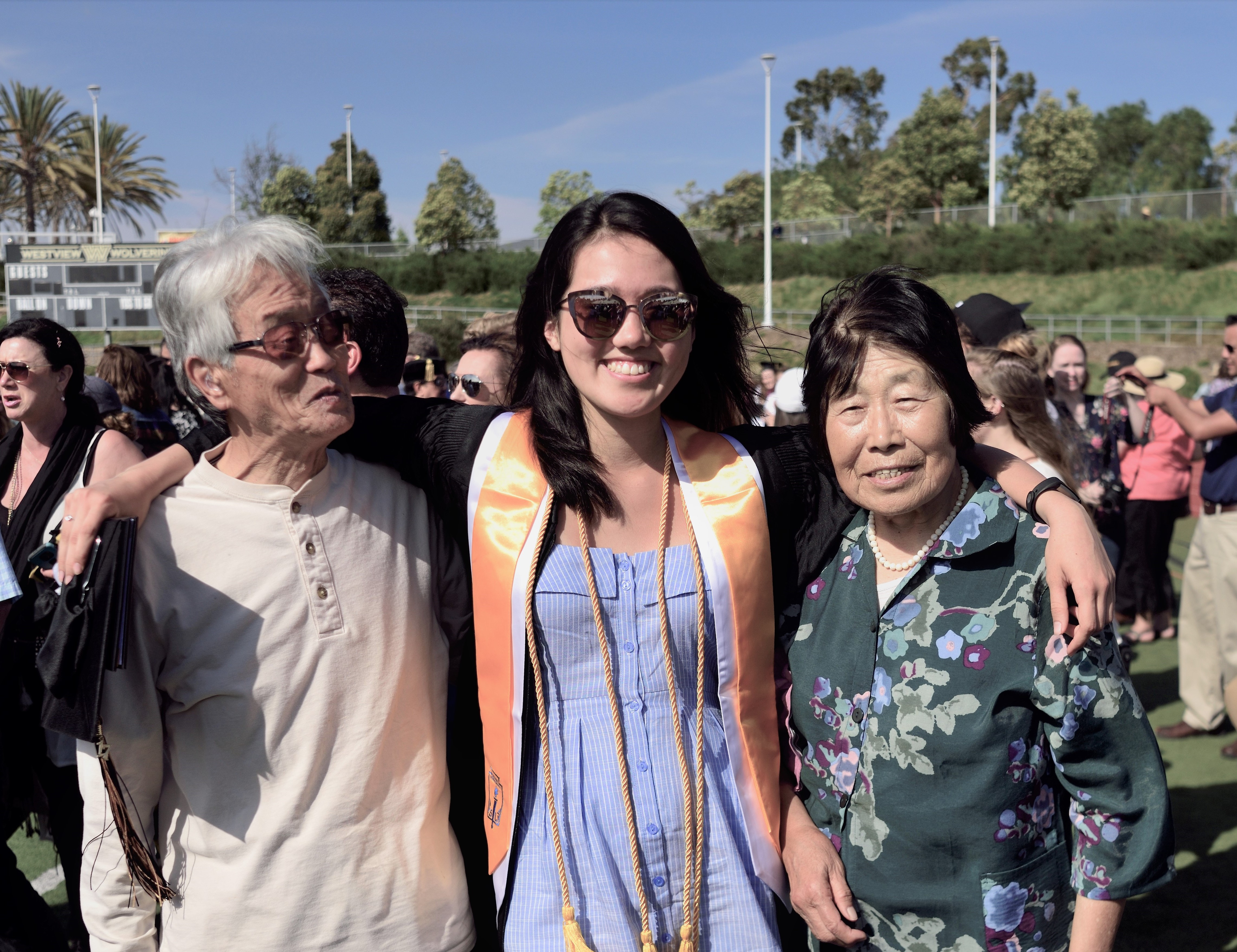 Photo of Grandparents and Myself at Graduation in 2017